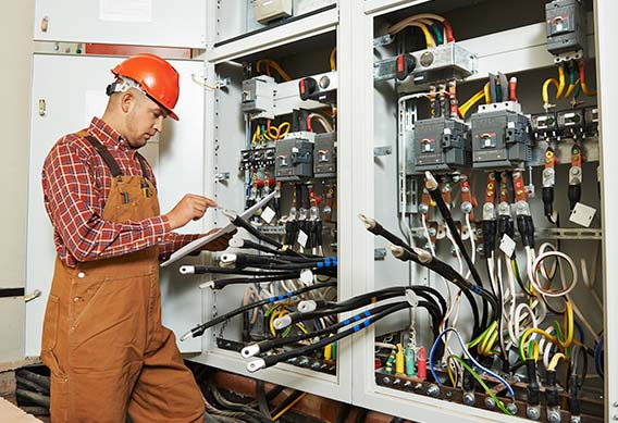 picture of electrician at electrical panel